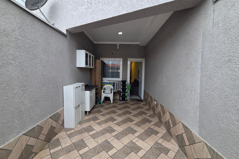 Sobrado com 2 suites 400 mts do mar vilamar caiçara Apartment in State of São Paulo