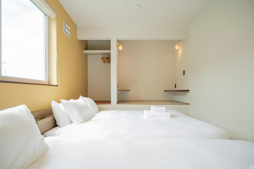 Bed, Photo of the whole room, Bedroom, towels, air conditioner