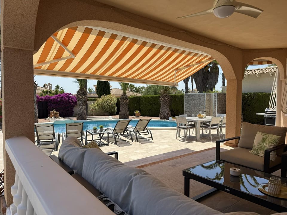 Property building, Living room, Swimming pool