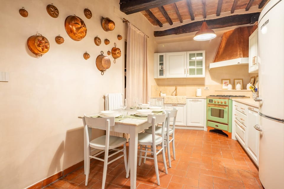 Kitchen or kitchenette, dishwasher, oven, stove