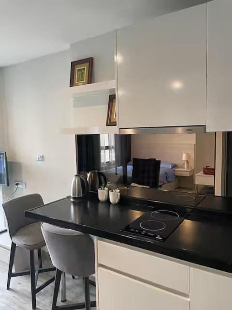 Kitchen or kitchenette, stove