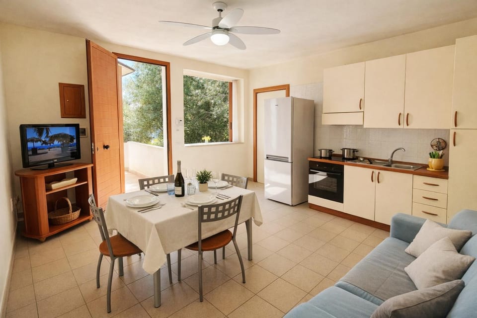 TV and multimedia, Kitchen or kitchenette, Living room, Seating area, Dining area, oven, stove