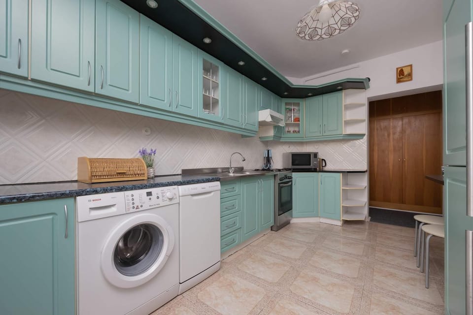 Kitchen or kitchenette, dishwasher, stove, washing machine