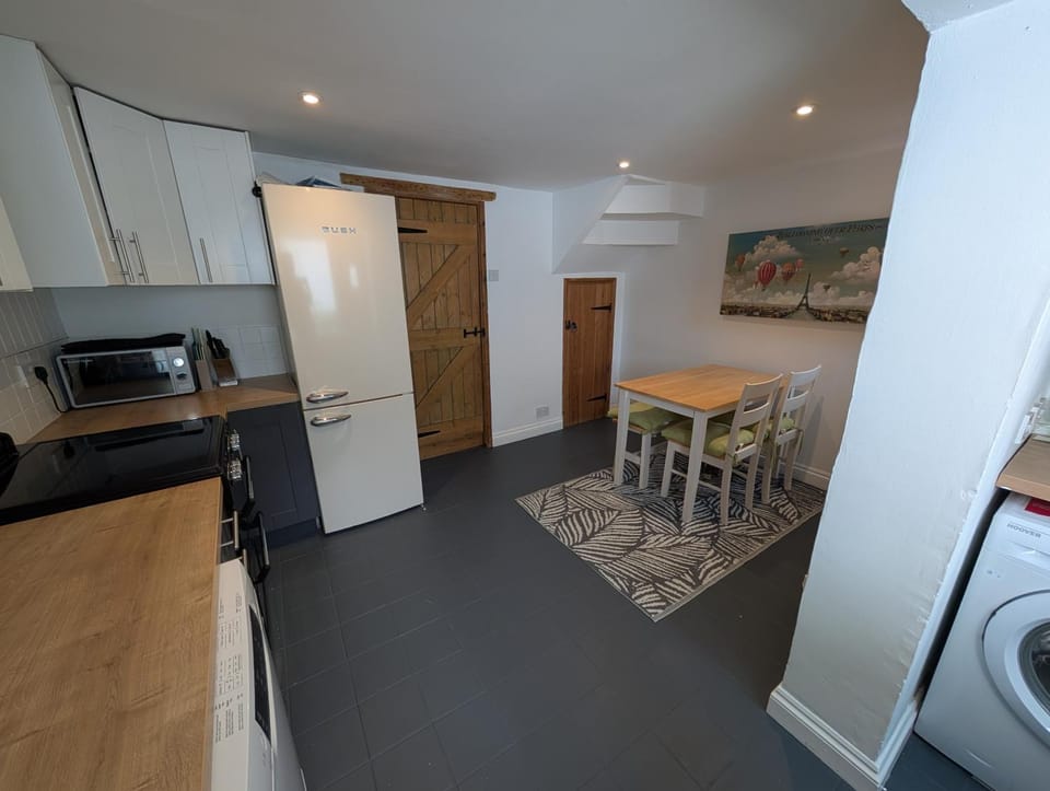 Kitchen or kitchenette, Dining area, dishwasher, oven