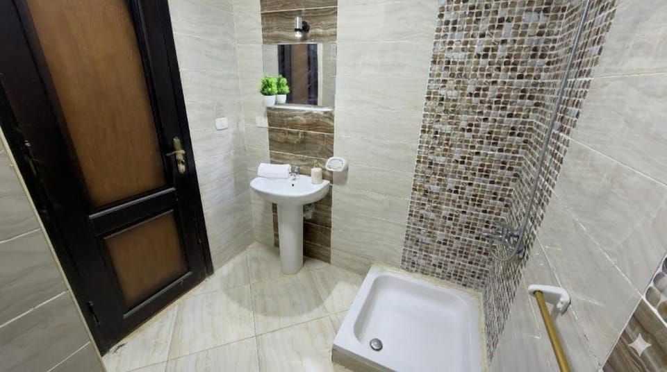 3BR Opposite Hyde Park - South 90 Apartment in New Cairo City