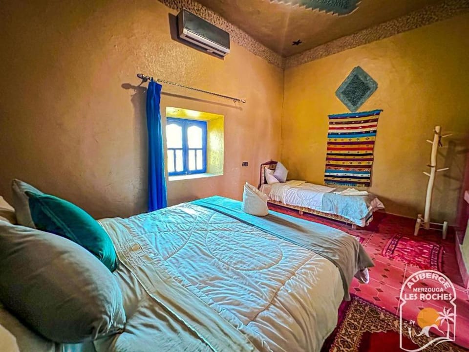 Bed, Photo of the whole room, Bedroom, towels, air conditioner