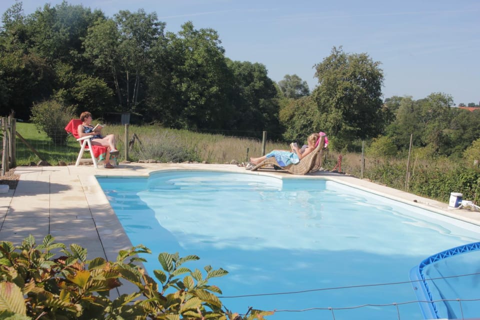 Property building, Living room, Swimming pool