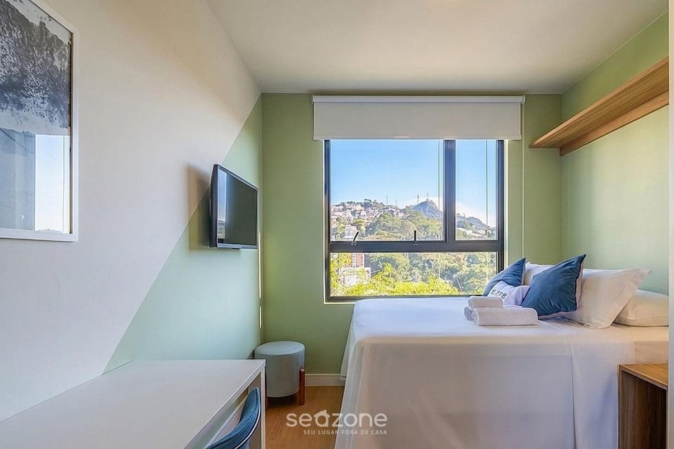 Bed, TV and multimedia, View (from property/room), Seating area, Bedroom