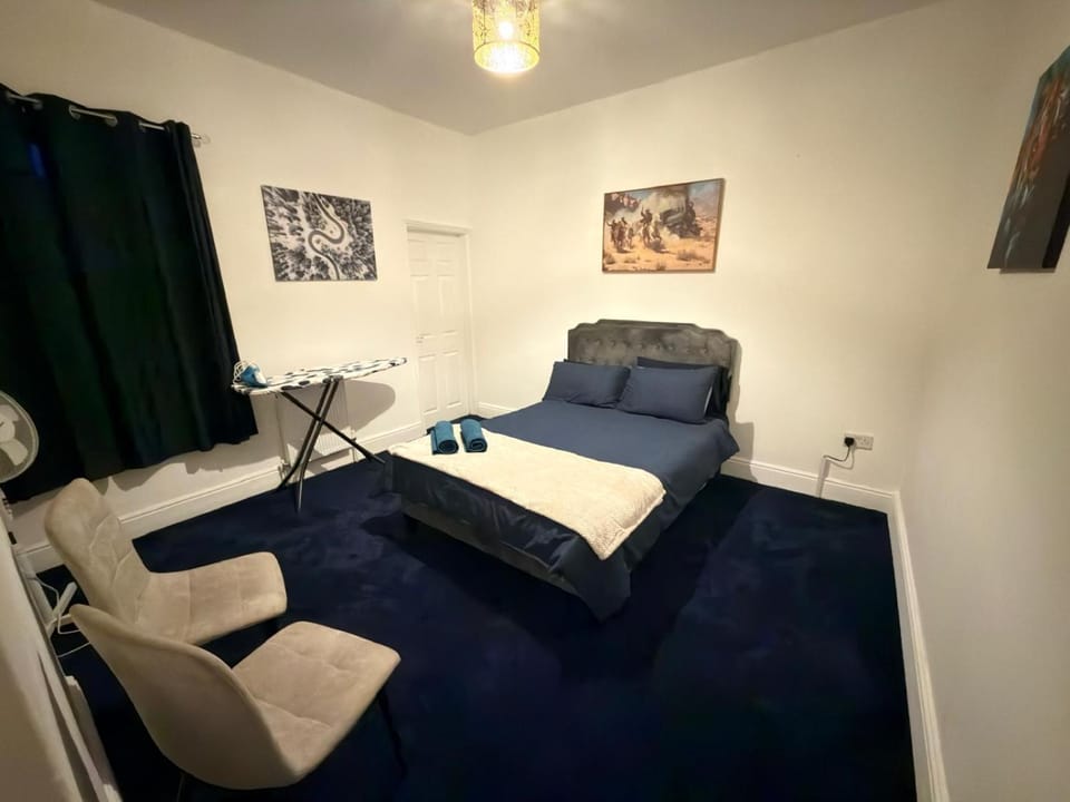 Bed, Seating area, Bedroom, flat iron, towels