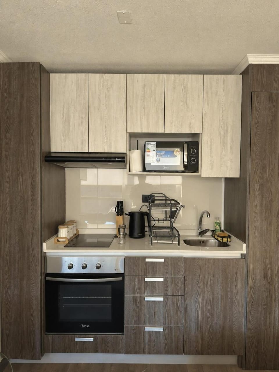 Kitchen or kitchenette, stove, toaster
