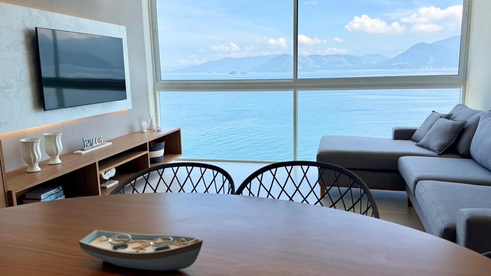 Communal lounge/ TV room, Natural landscape, Living room, Dining area, Sea view