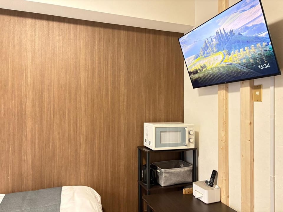 Kitchen or kitchenette, microwave