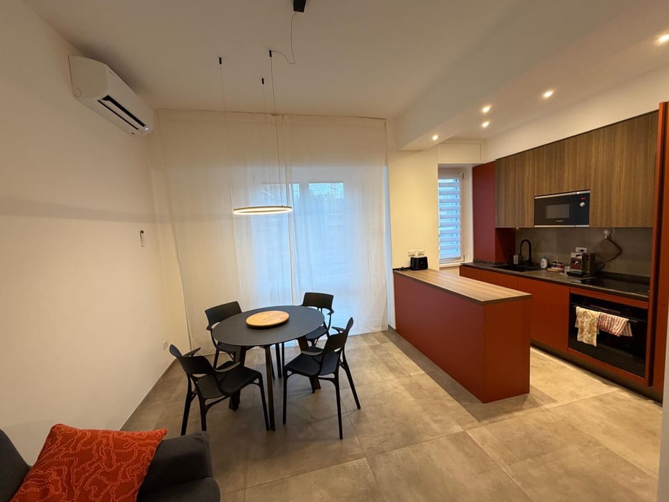 Kitchen or kitchenette, Living room, Seating area, Dining area, oven, stove, toaster