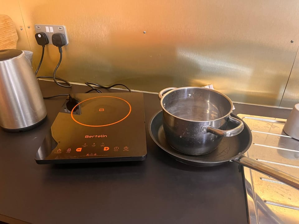 Kitchen or kitchenette, stove