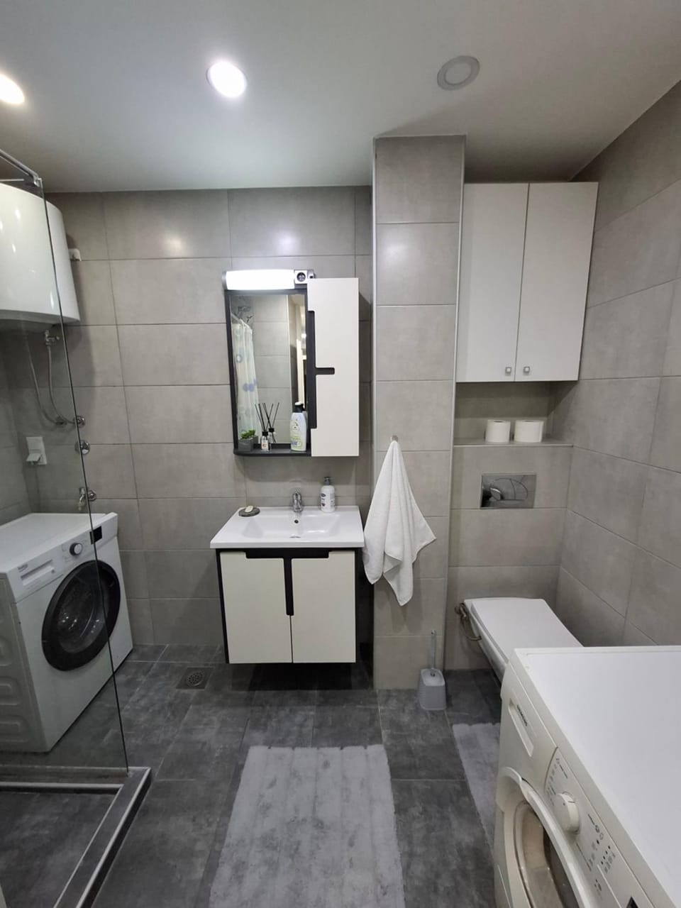 Bathroom, towels, washing machine, dryer