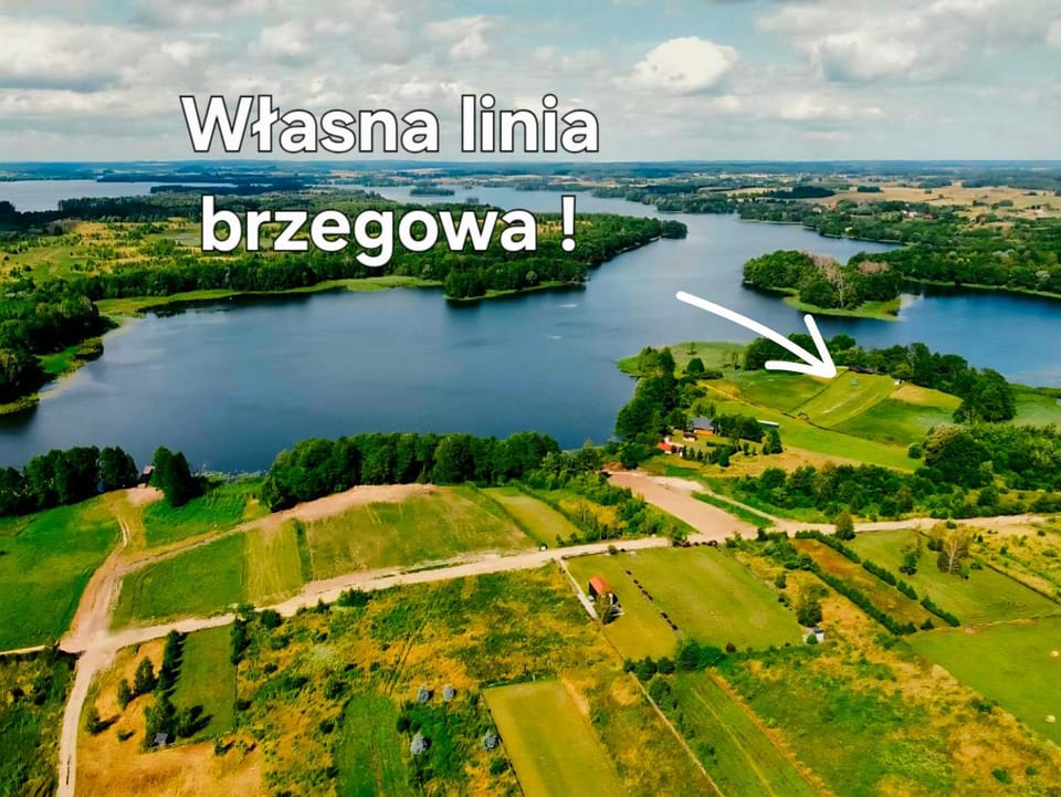 Puchaczówka - domki letniskowe z własną linią brzegową Campground/ 
RV Resort in Poland
