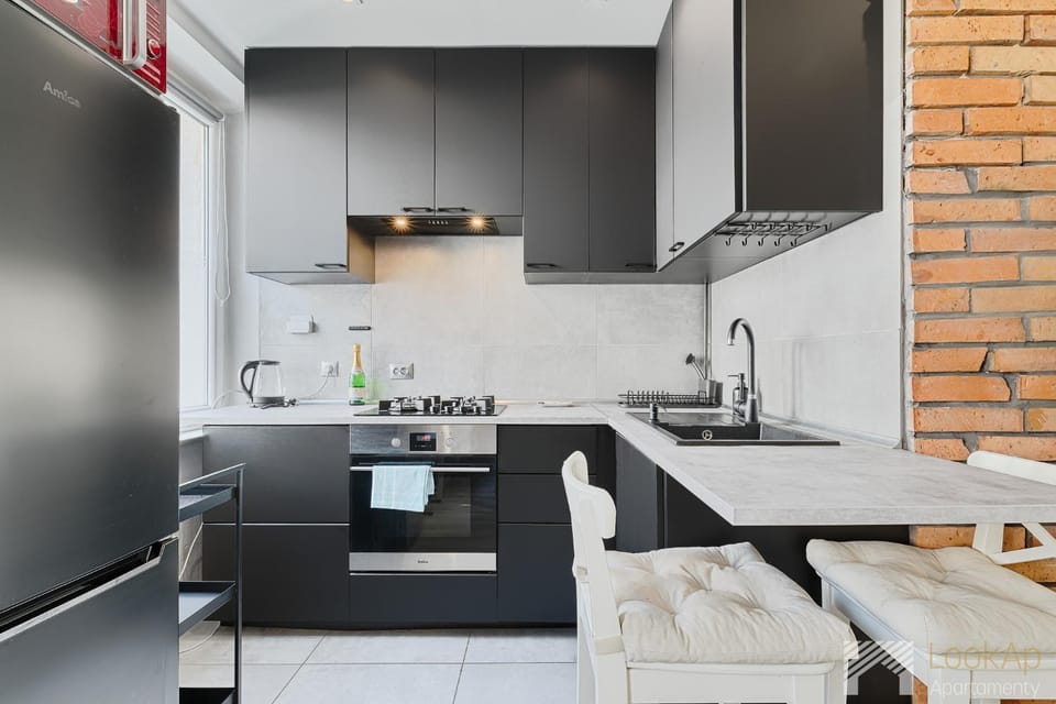 Kitchen or kitchenette, oven, stove