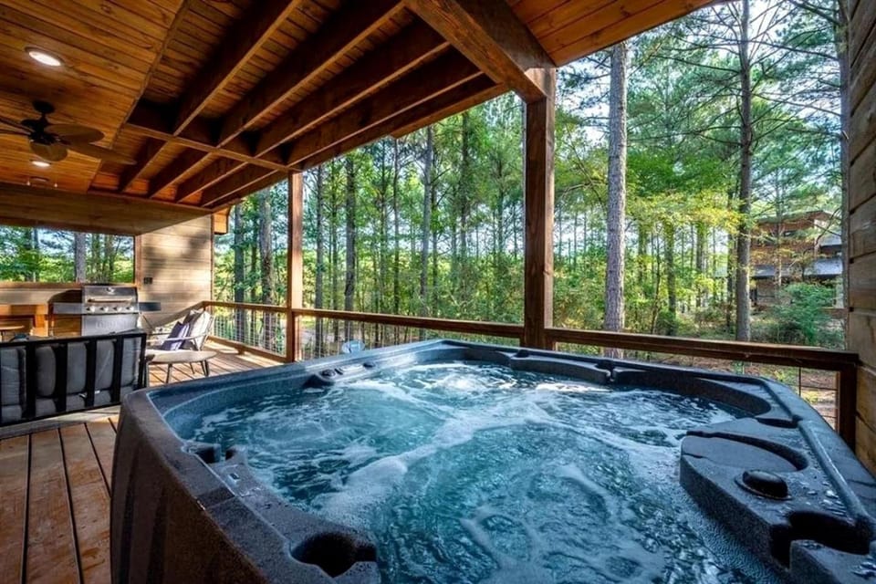 Secluded Cabin Perfect for Couples & Families with Hot Tub & Stone Fireplace in Broken Bow, Oklahoma Cabin in Broken Bow