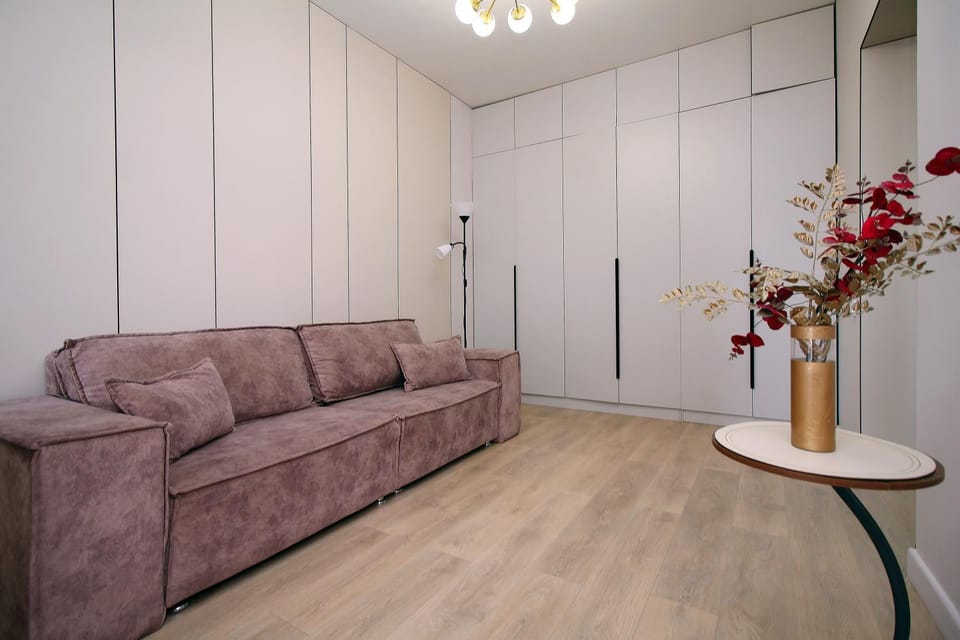 Bed, Living room, Seating area, wardrobe