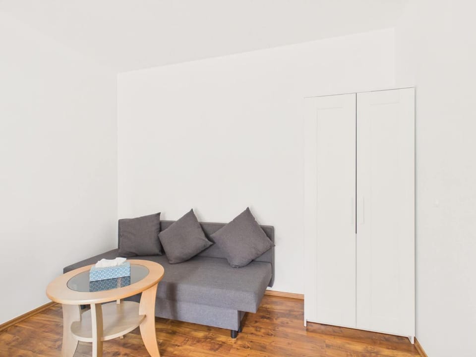Bed, Seating area, wardrobe