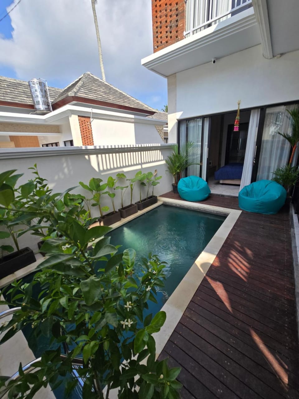 Swimming pool, sunbed