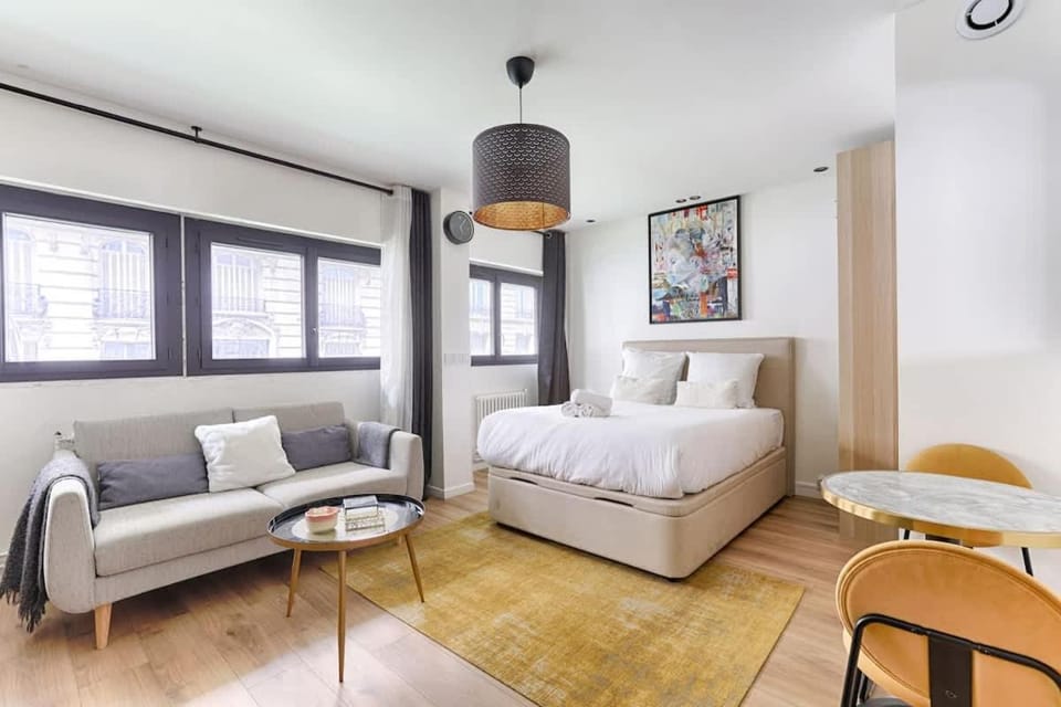 Bed, Living room, Seating area, Bedroom