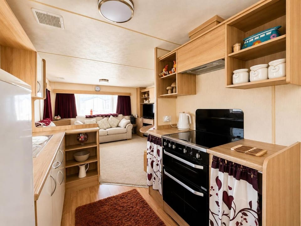 Homely caravan with side decking at Felixstowe Beach Holiday Park ref 55032PA House in Felixstowe