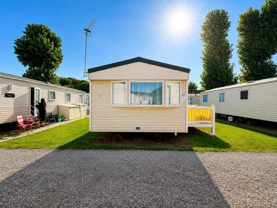 Homely caravan with side decking at Felixstowe Beach Holiday Park ref 55032PA House in Felixstowe