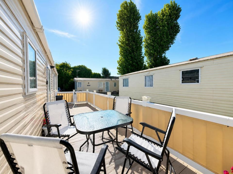 Homely caravan with side decking at Felixstowe Beach Holiday Park ref 55032PA House in Felixstowe
