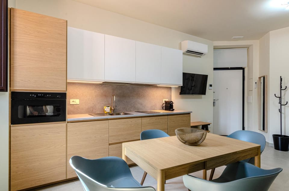 Kitchen or kitchenette, Living room, Seating area, stove, air conditioner