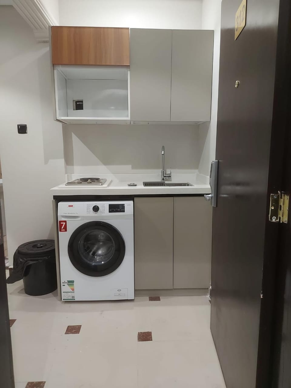 Kitchen or kitchenette, washing machine
