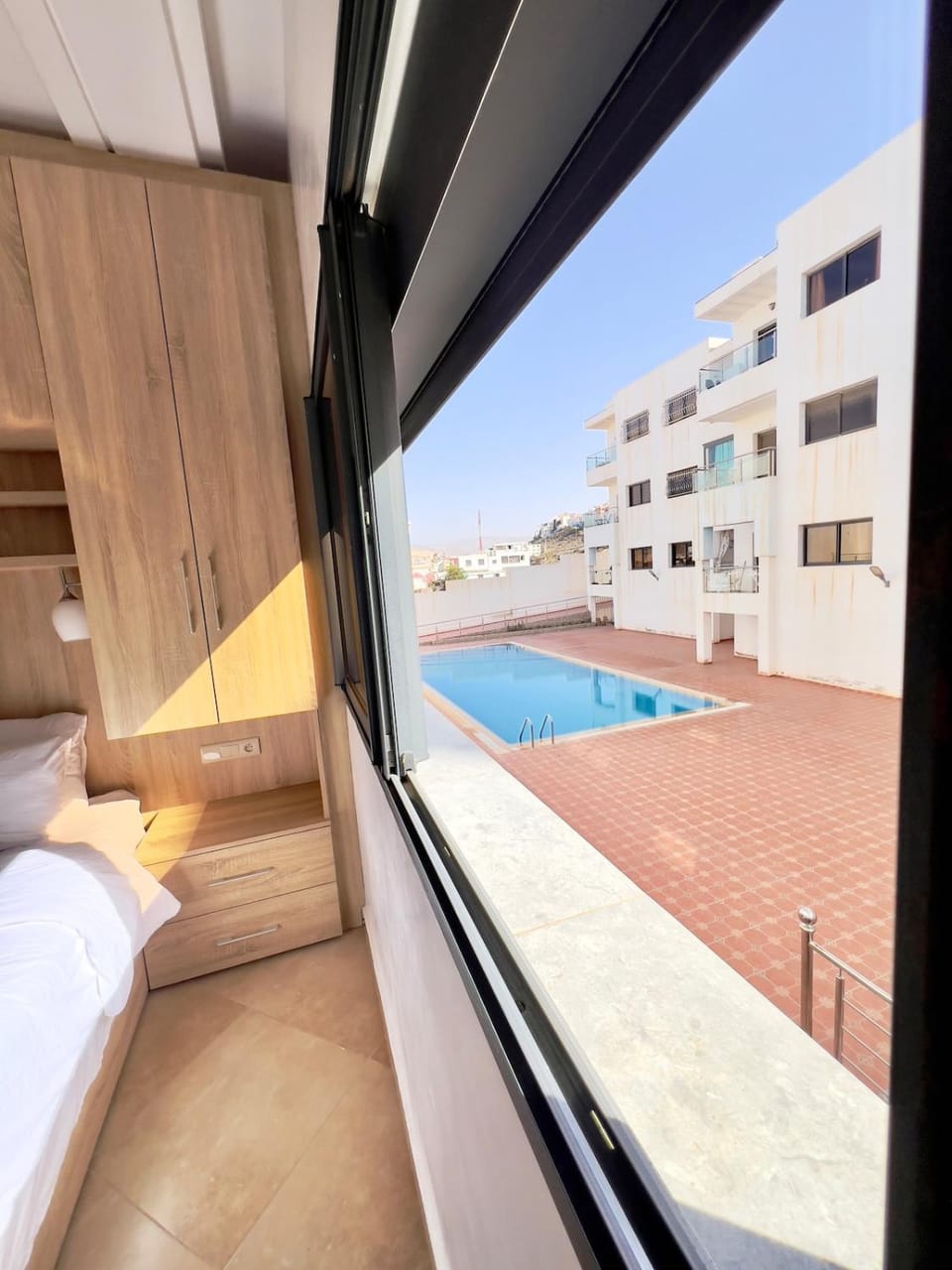 Beachfront 2BR Balcony Pool Atlas Mtn View Surf Apartment in Souss-Massa