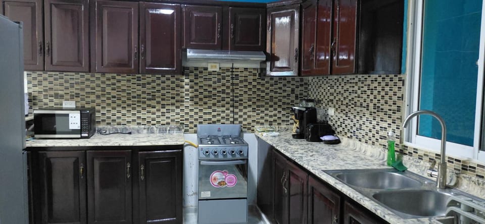 Kitchen or kitchenette, oven, toaster