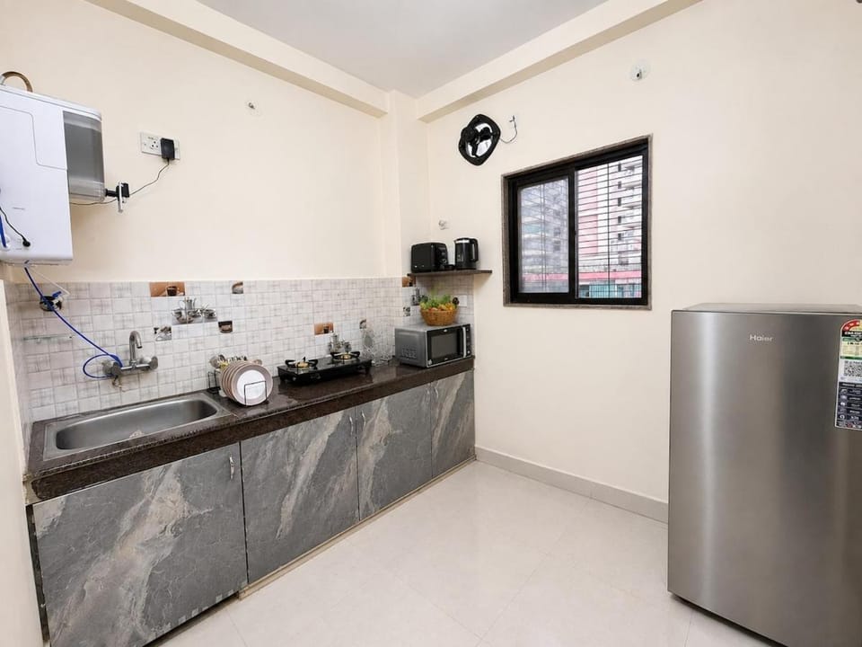 Kitchen or kitchenette, oven, stove