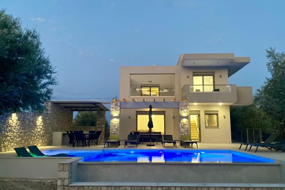 Property building, Patio, Night, Pool view, Swimming pool, sunbed