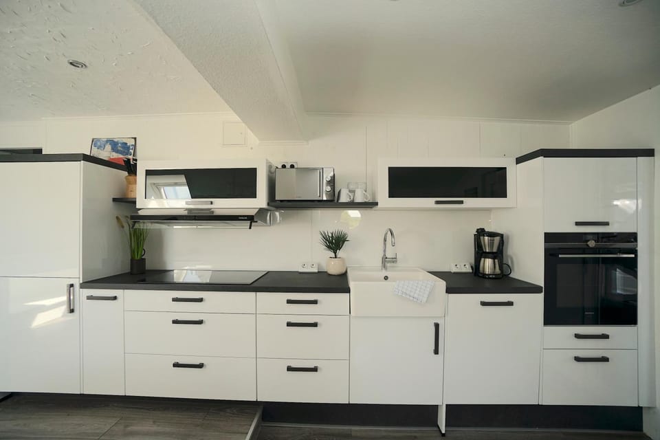 Ferienhaus ‚Sünnhus‘ am Wittensee – ruhiger Rückzugsort im Grünen House in Schleswig-Holstein