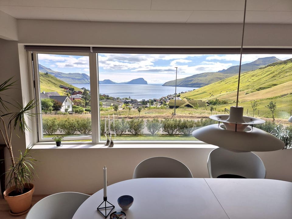 Panoramic Fjord Views in Modern Kvivik House House in Europe