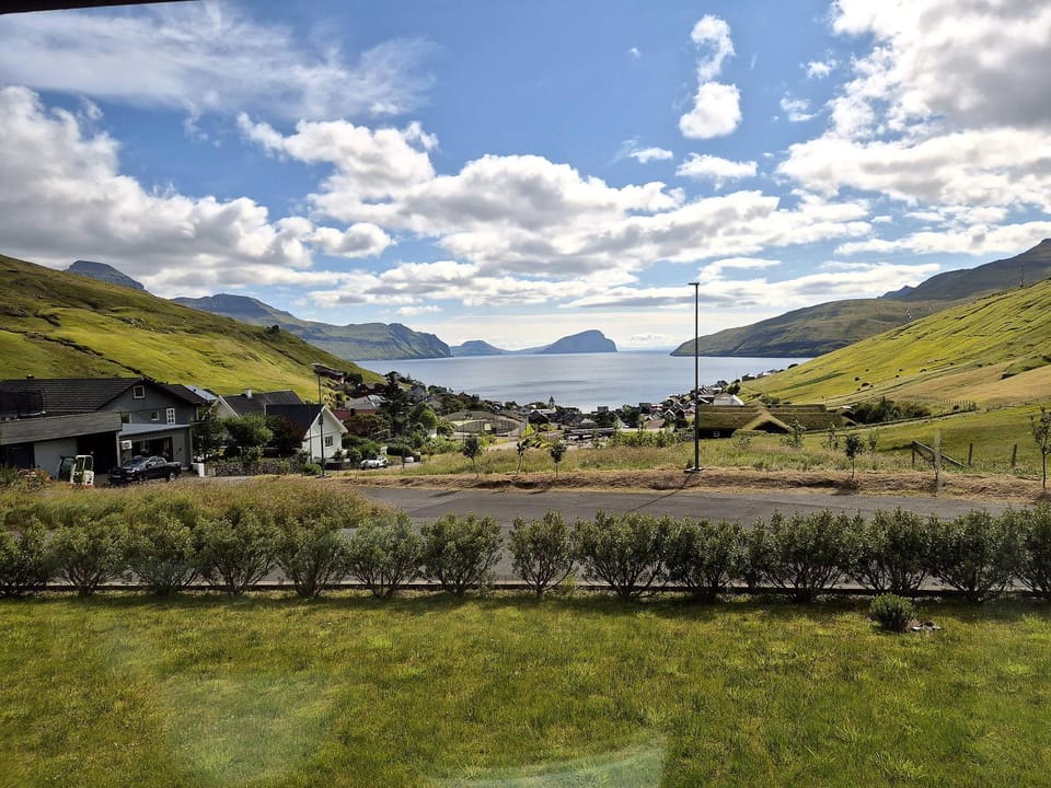 Panoramic Fjord Views in Modern Kvivik House House in Europe
