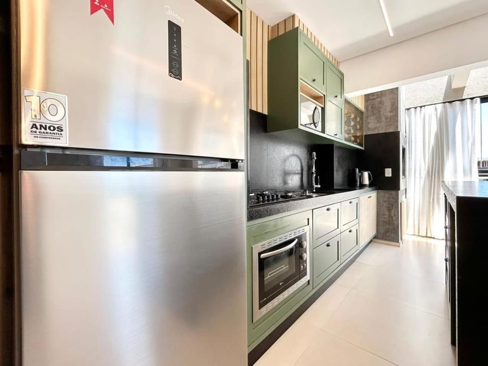 Kitchen or kitchenette, dishwasher, minibar, oven, stove