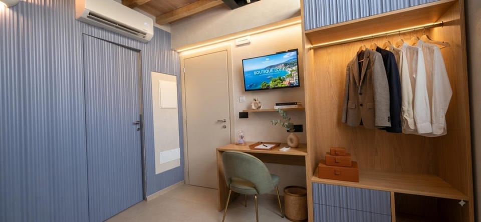 TV and multimedia, Kitchen or kitchenette, wardrobe, air conditioner