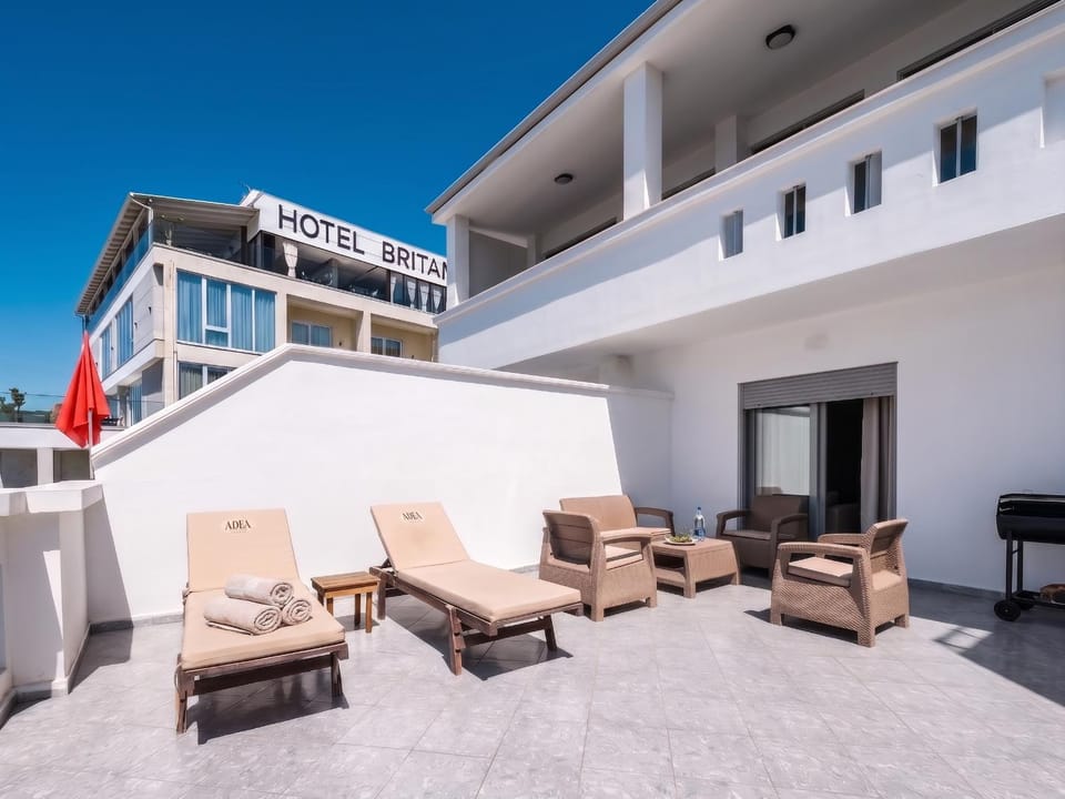 Property building, Patio, Day, View (from property/room), Balcony/Terrace, Balcony/Terrace, Living room, Seating area, sunbed