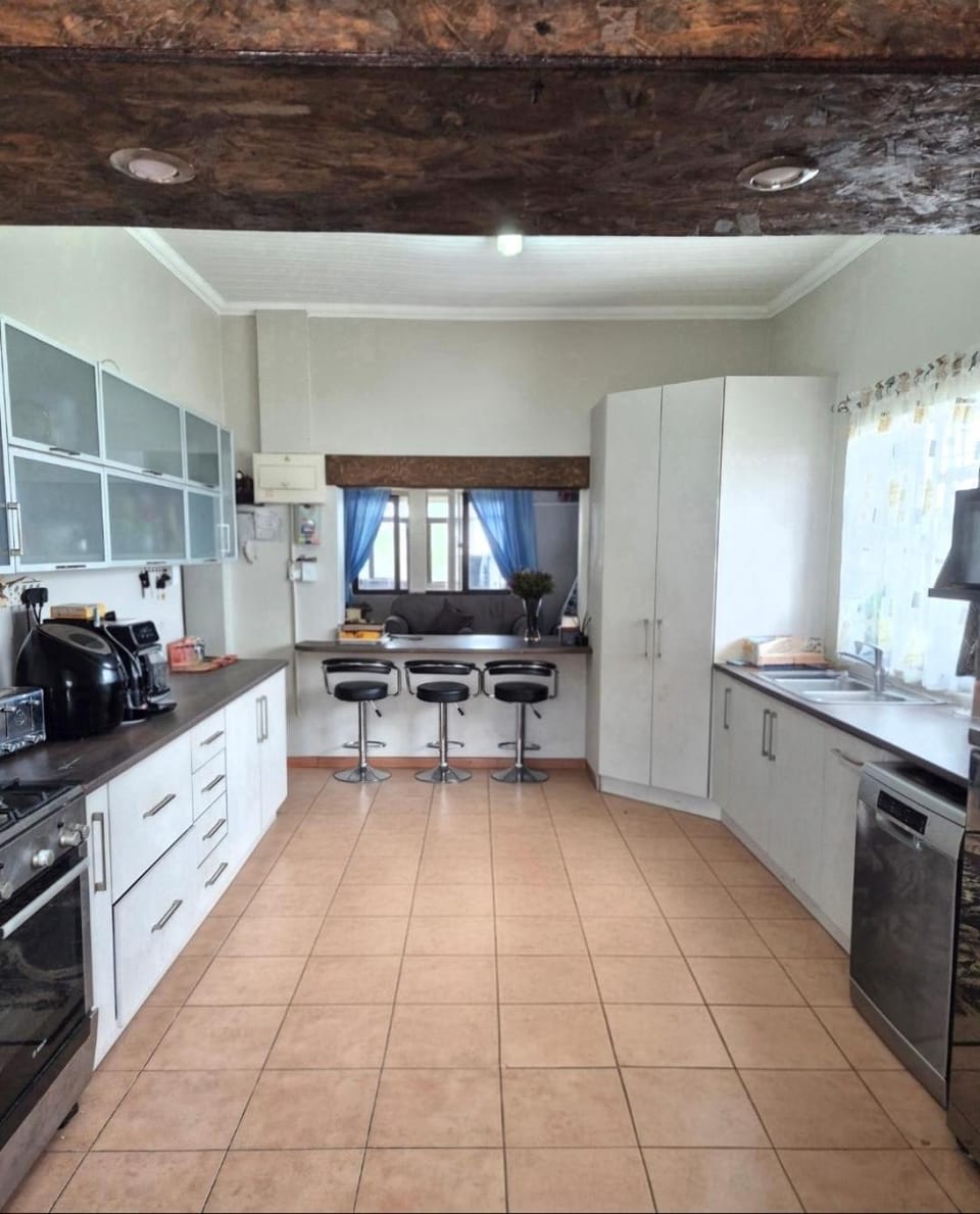 Kitchen or kitchenette, Dining area, dishwasher, stove, toaster