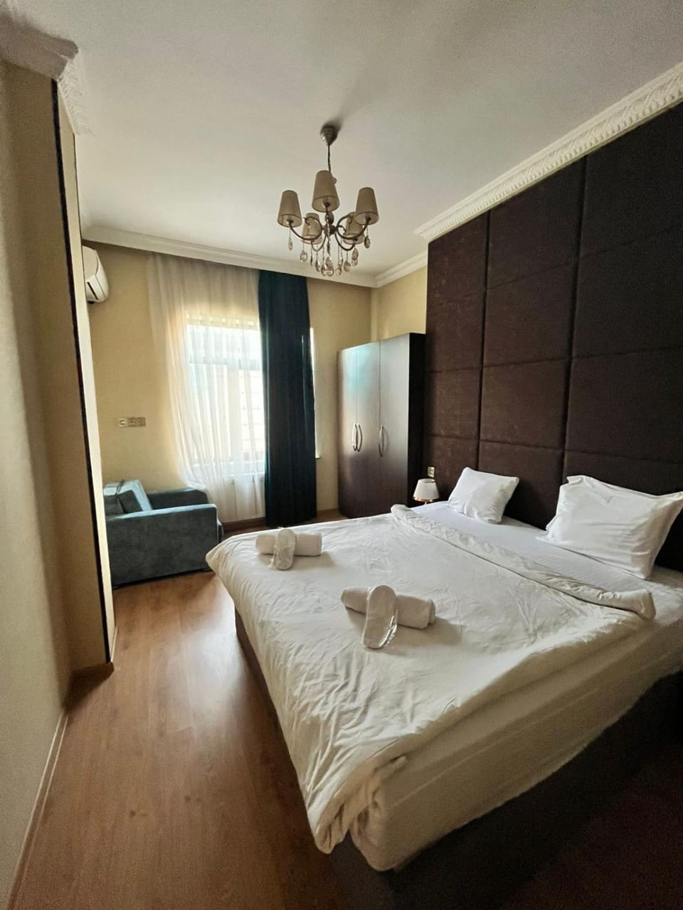 Bed, Living room, Photo of the whole room, Seating area, Bedroom, towels, wardrobe