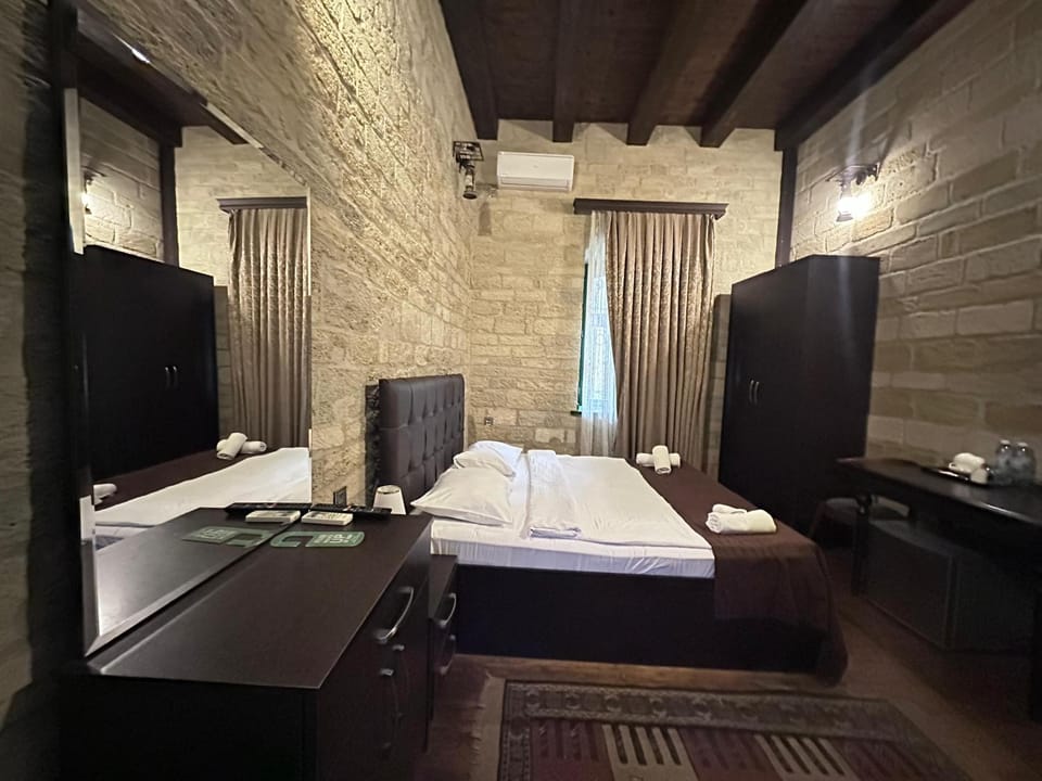 Bed, Bathroom, Photo of the whole room, towels, air conditioner
