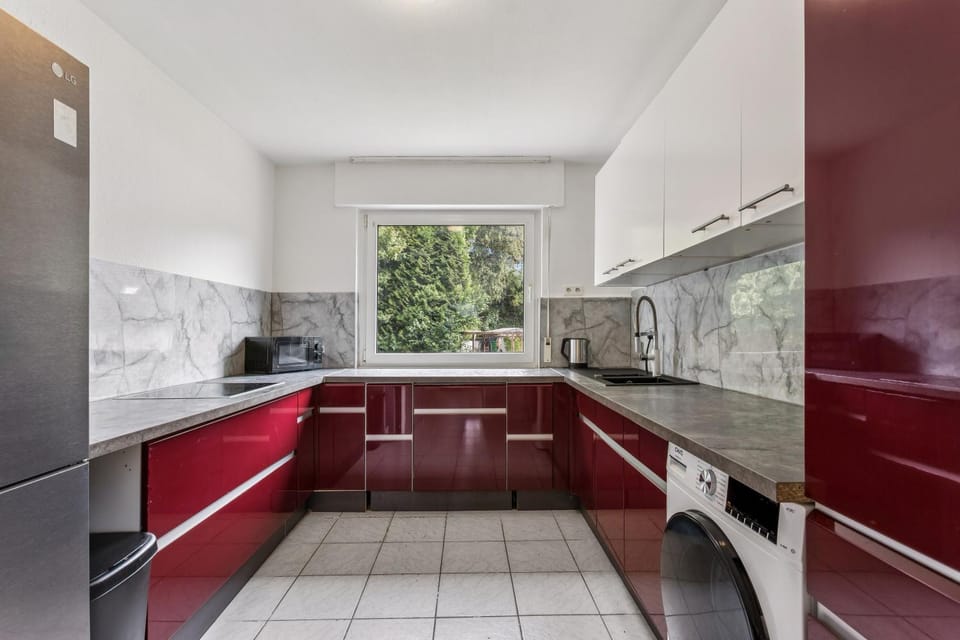 Kitchen or kitchenette, dishwasher, microwave, stove, washing machine, kitchen