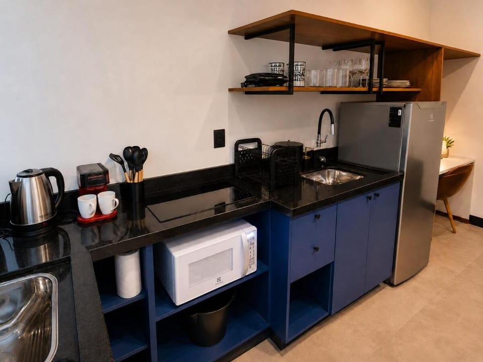 Studio Echo Living 05 Novo Completo com Ar Quente e Frio, Cozinha Completa, Wifi, Vaga para Veículo Apartment in Chapecó