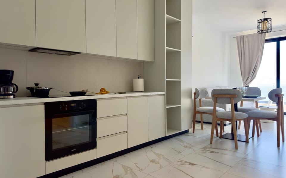 Kitchen or kitchenette, Living room, Seating area, Dining area, stove