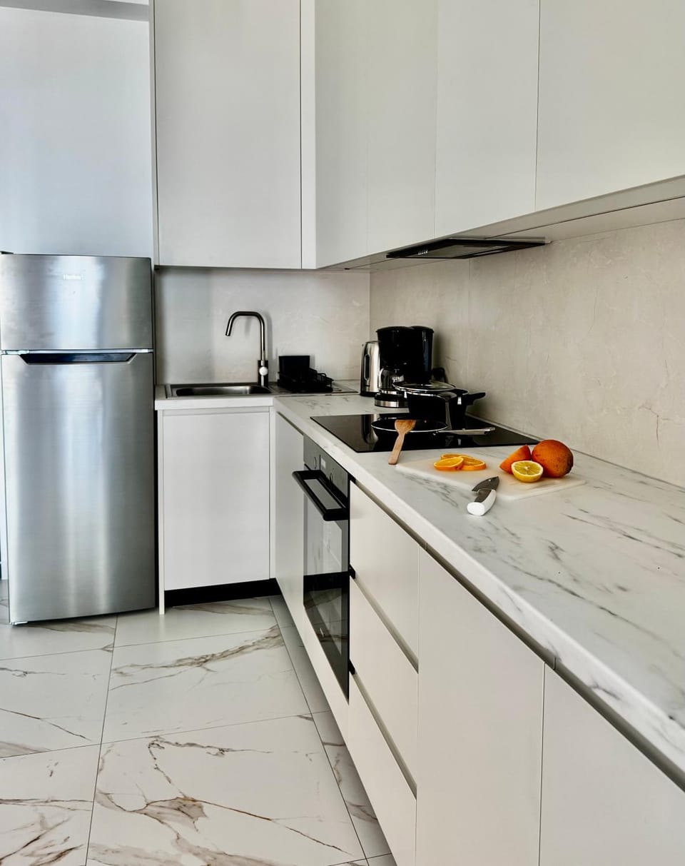Kitchen or kitchenette, oven, stove