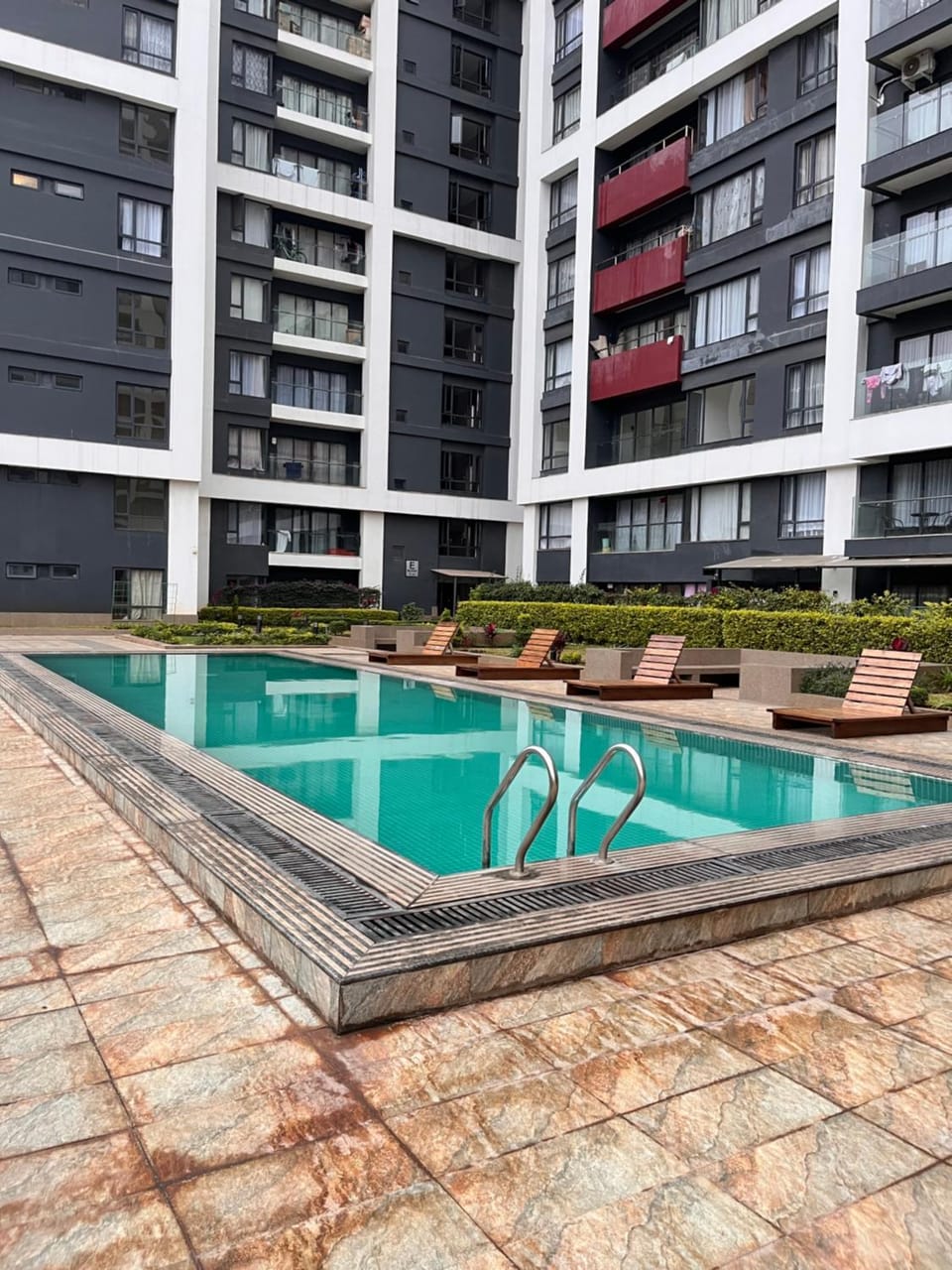 Property building, Patio, Day, Pool view, Swimming pool, sunbed
