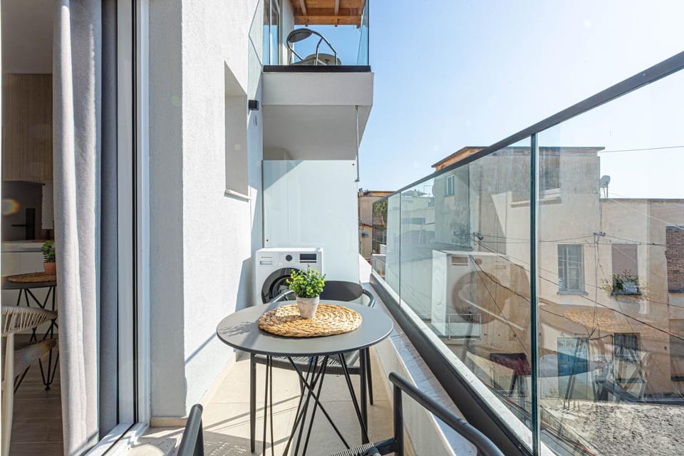 Property building, Day, View (from property/room), Balcony/Terrace, City view, washing machine